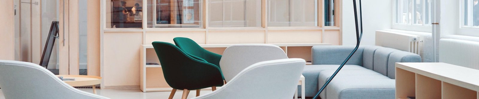 Coworking space with green and gray chairs