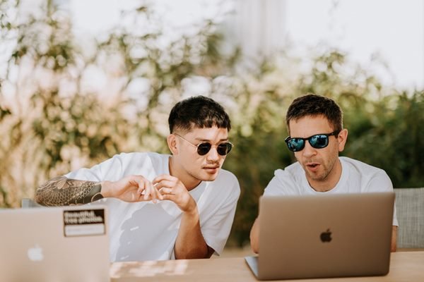 Men looking at the laptop