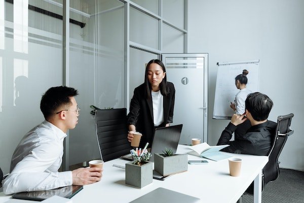 People discussing business in a meeting room