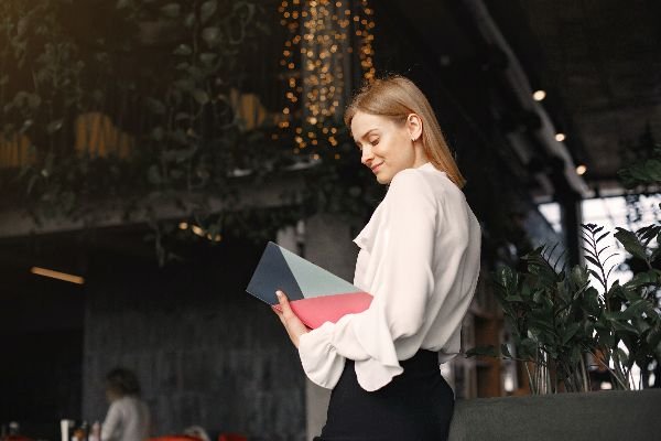 business woman holding her purse